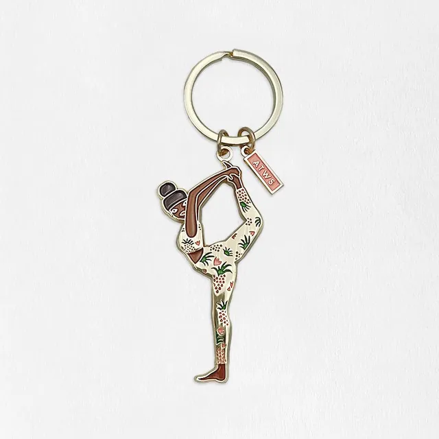 all-the-ways-to-say-yoga-schl-sselanh-nger-gold-emaille image 1